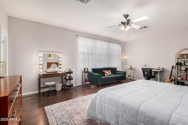 bedroom featuring dark wood-style floors, visible vents, and baseboards