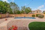 view of pool featuring a fenced in pool, a patio, and fence