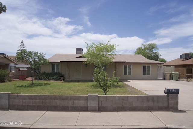 8334 N 55th Ave, Glendale, AZ 85302 - ranch-style home featuring driveway, stucco siding, and central air condition unit