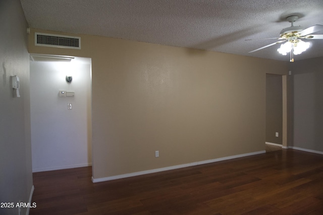 8334 N 55th Ave, Glendale, AZ 85302 - unfurnished room with wood finished floors, a ceiling fan, a textured ceiling, and baseboards