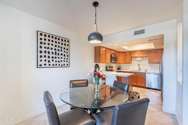 8414 N Central Ave Unit C, Phoenix, AZ 85020 - dining room featuring light tile patterned floors and baseboards