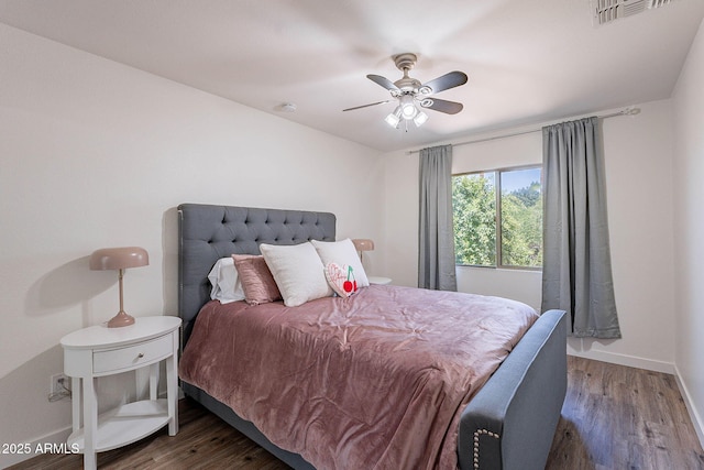8414 N Central Ave Unit C, Phoenix, AZ 85020 - bedroom featuring wood finished floors, baseboards, and a ceiling fan