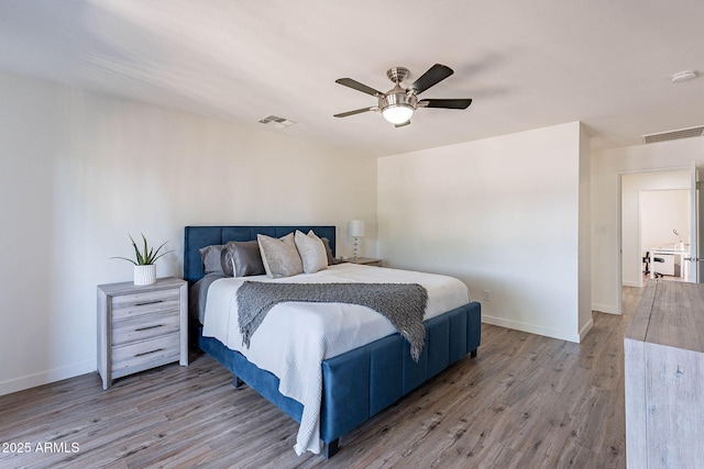 8414 N Central Ave Unit C, Phoenix, AZ 85020 - bedroom featuring wood finished floors, baseboards, and ceiling fan