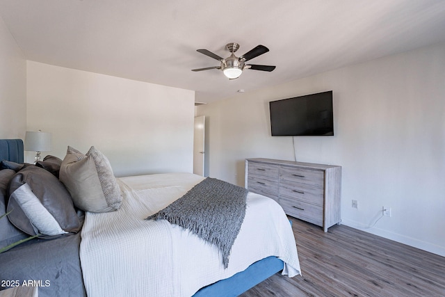 8414 N Central Ave Unit C, Phoenix, AZ 85020 - bedroom with baseboards, wood finished floors, and ceiling fan