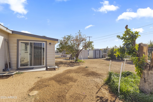 view of yard with a shed