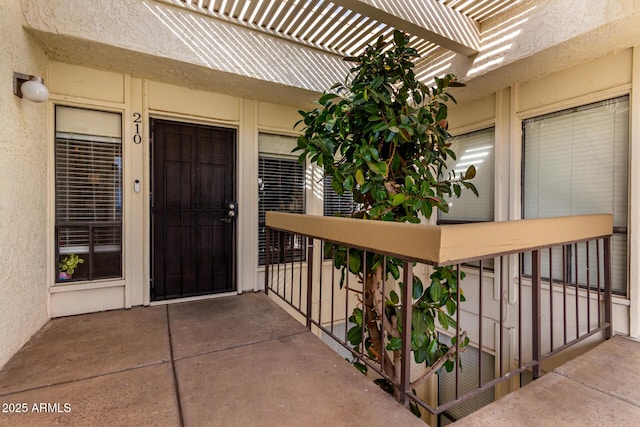 property entrance with a balcony