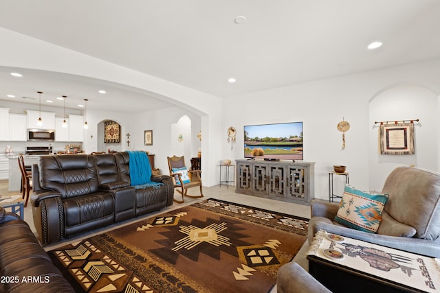 3655 N Astoria Dr, Florence, AZ 85132 - living room featuring arched walkways and recessed lighting