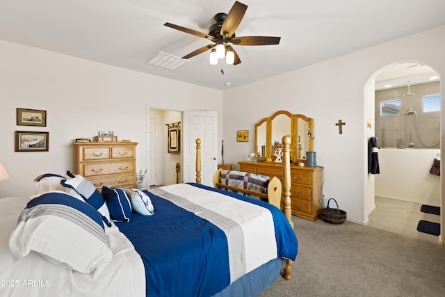 3655 N Astoria Dr, Florence, AZ 85132 - carpeted bedroom with arched walkways and a ceiling fan