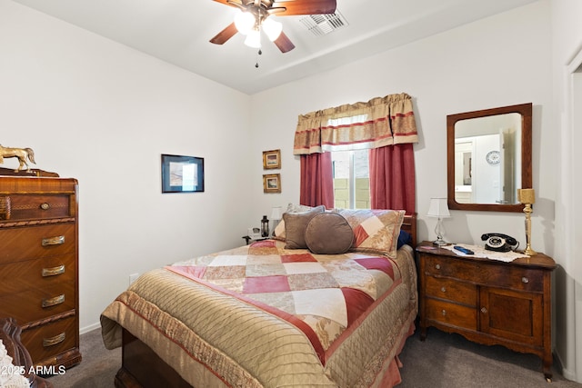 3655 N Astoria Dr, Florence, AZ 85132 - bedroom with dark colored carpet, a ceiling fan, and baseboards