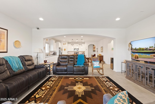 3655 N Astoria Dr, Florence, AZ 85132 - living room with arched walkways, recessed lighting, and light tile patterned flooring