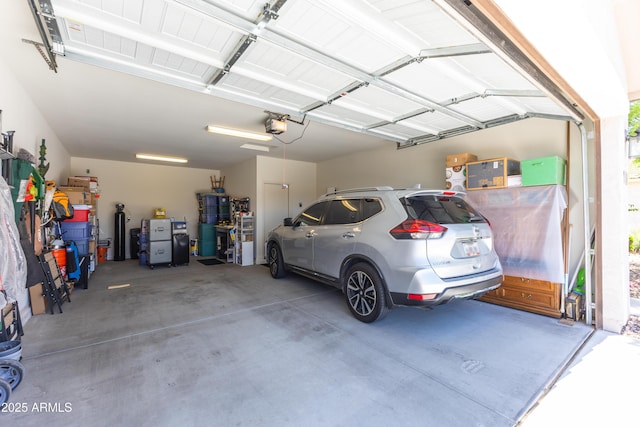 3655 N Astoria Dr, Florence, AZ 85132 - garage featuring a garage door opener