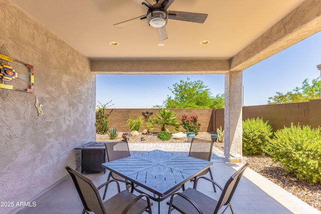 3655 N Astoria Dr, Florence, AZ 85132 - fenced backyard featuring outdoor dining space, a patio, and ceiling fan