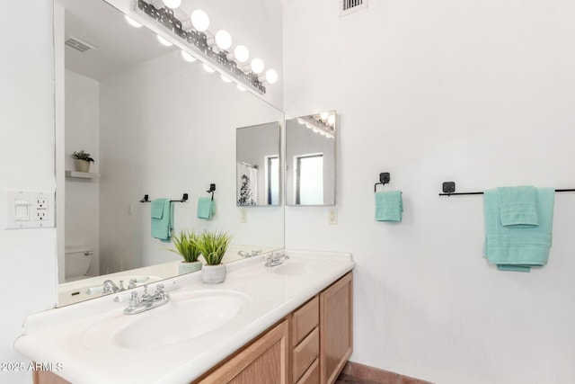 1730 W Adamanda Ct, Phoenix, AZ 85086 - full bathroom featuring toilet and double vanity