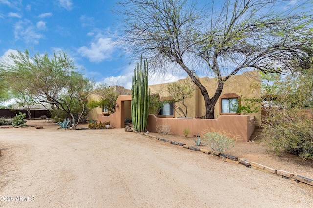 1730 W Adamanda Ct, Phoenix, AZ 85086 - pueblo-style home with stucco siding