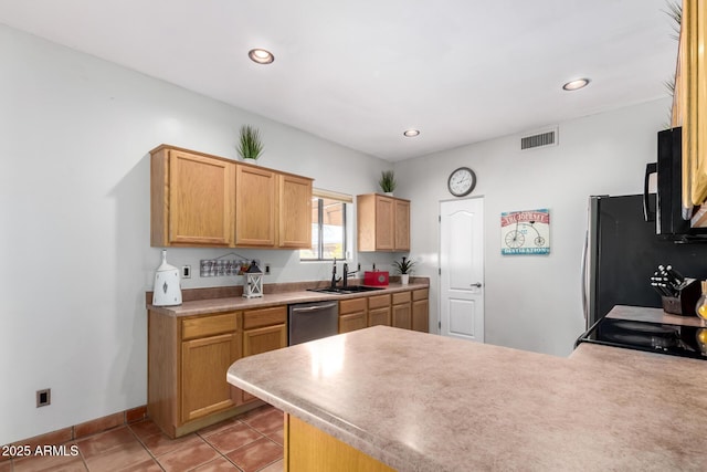 1730 W Adamanda Ct, Phoenix, AZ 85086 - kitchen with a sink, stainless steel appliances, a peninsula, light tile patterned flooring, and light countertops