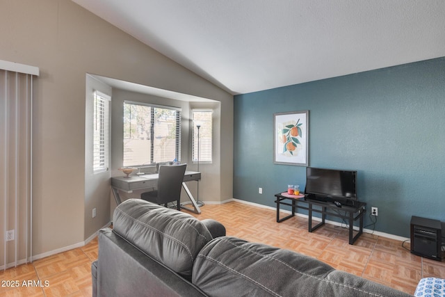 living room featuring light parquet flooring and vaulted ceiling