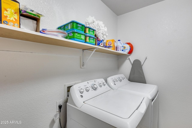 laundry room with washer and dryer