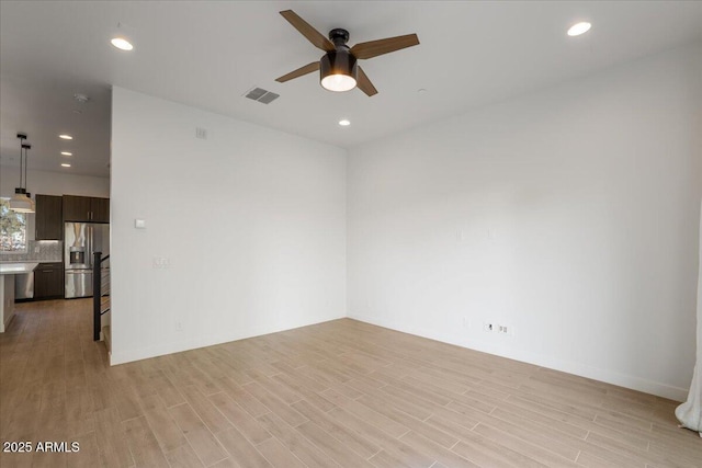 1717 E Morten Ave Unit 2, Phoenix, AZ 85020 - unfurnished room with light hardwood / wood-style floors and ceiling fan