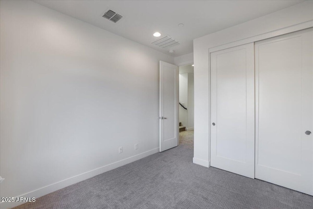 1717 E Morten Ave Unit 2, Phoenix, AZ 85020 - unfurnished bedroom with a closet and carpet flooring