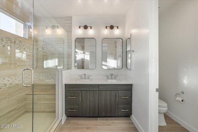 1717 E Morten Ave Unit 2, Phoenix, AZ 85020 - bathroom featuring toilet, a shower with door, and vanity