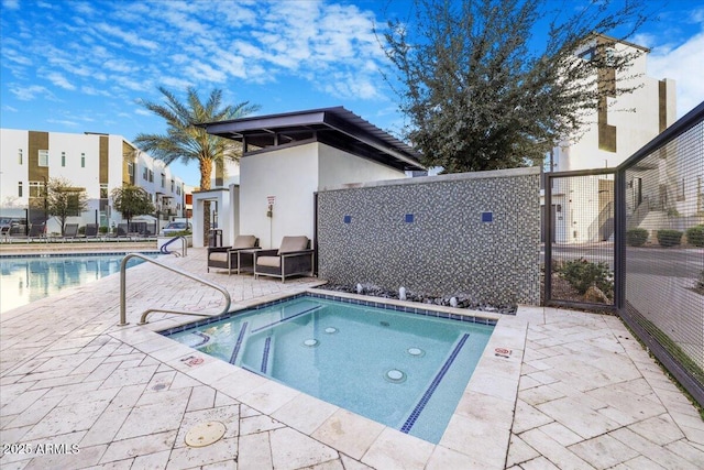1717 E Morten Ave Unit 2, Phoenix, AZ 85020 - view of swimming pool with a patio area and a community hot tub