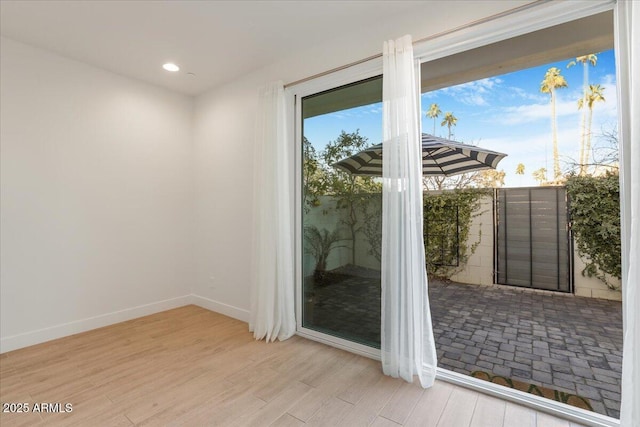 1717 E Morten Ave Unit 2, Phoenix, AZ 85020 - doorway with light hardwood / wood-style floors