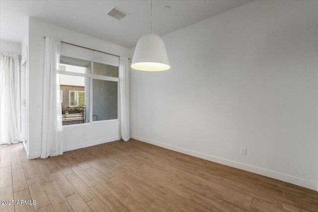 1717 E Morten Ave Unit 2, Phoenix, AZ 85020 - unfurnished room featuring hardwood / wood-style flooring