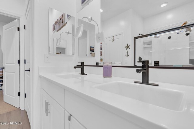 6754 E Via Rancho Rosario, Tucson, AZ 85756 - full bathroom featuring double vanity, recessed lighting, and a shower with shower door