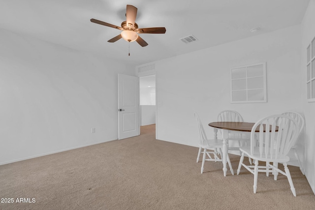 6754 E Via Rancho Rosario, Tucson, AZ 85756 - carpeted dining space with ceiling fan