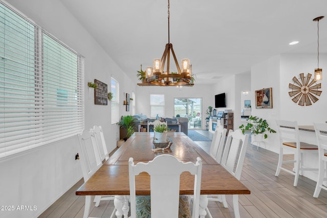6754 E Via Rancho Rosario, Tucson, AZ 85756 - dining area featuring a chandelier, light wood-style flooring, baseboards, and recessed lighting