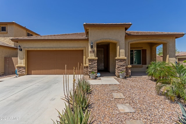 view of front of property featuring a garage