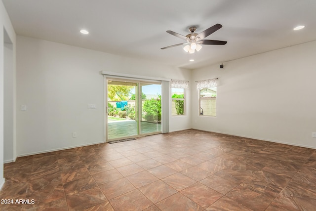 spare room with ceiling fan