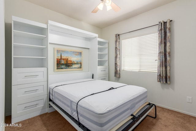 bedroom with ceiling fan and carpet floors