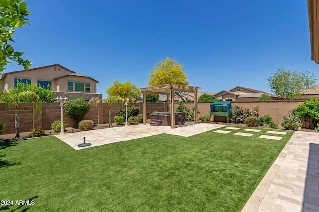 view of yard featuring a hot tub, a pergola, and a patio area