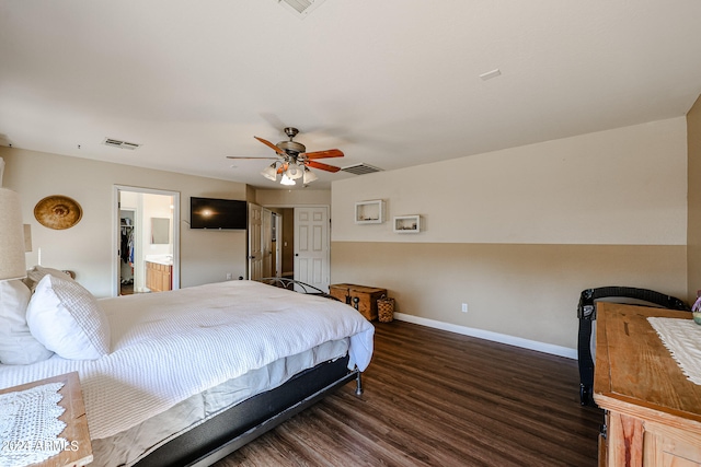 bedroom featuring dark wood-type flooring, ceiling fan, and connected bathroom