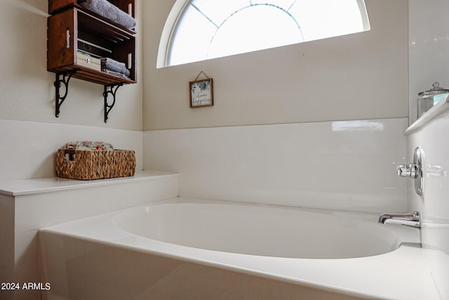 bathroom featuring a tub