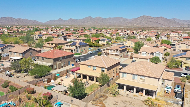 birds eye view of property featuring a mountain view