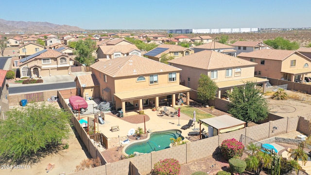 birds eye view of property featuring a mountain view