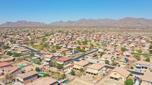 birds eye view of property featuring a mountain view