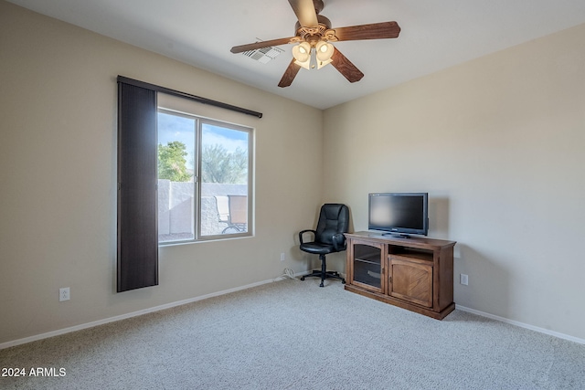 office area featuring light colored carpet and ceiling fan