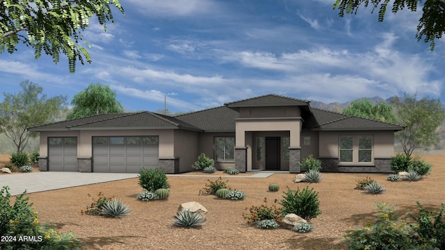 prairie-style home featuring a garage