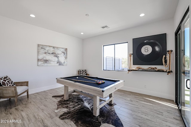 recreation room with pool table and light hardwood / wood-style floors