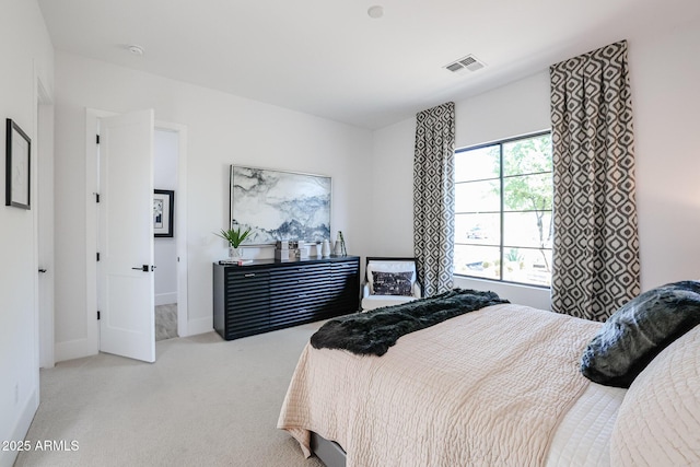 bedroom with light carpet