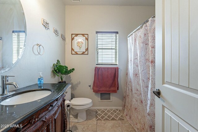 bathroom with tile patterned floors, visible vents, toilet, and vanity