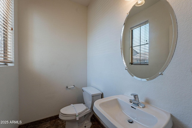1244 S Tacoma, Mesa, AZ 85209 - bathroom with a sink, toilet, and baseboards