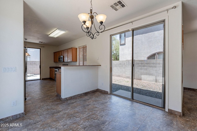 1244 S Tacoma, Mesa, AZ 85209 - kitchen featuring baseboards, a chandelier, appliances with stainless steel finishes, a peninsula, and hanging light fixtures