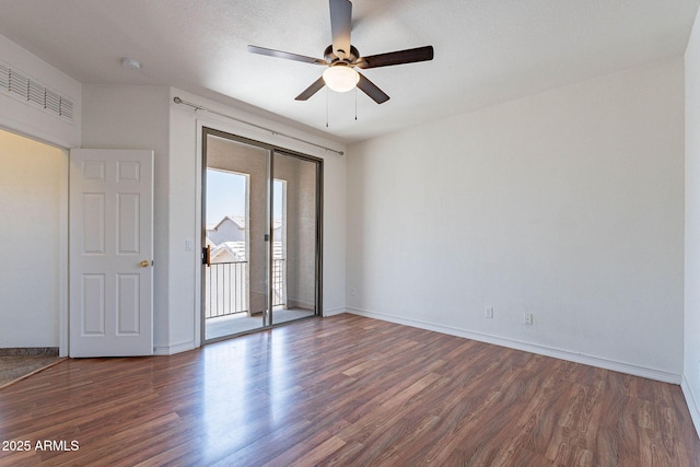 1244 S Tacoma, Mesa, AZ 85209 - empty room featuring a ceiling fan, wood finished floors, baseboards, and a smoke detector