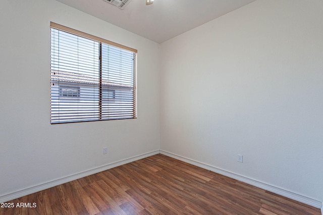 1244 S Tacoma, Mesa, AZ 85209 - unfurnished room with wood finished floors and baseboards