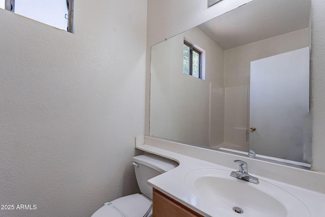 1244 S Tacoma, Mesa, AZ 85209 - full bathroom featuring vanity, toilet, and a textured wall