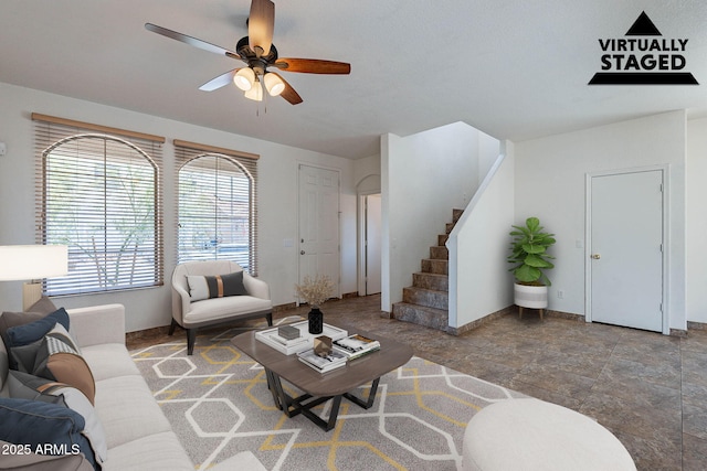 1244 S Tacoma, Mesa, AZ 85209 - living room with a ceiling fan, stairway, baseboards, and stone finish floors